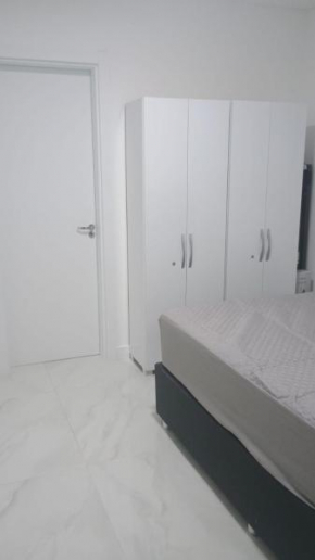 Apartamento Novo de frente no centro de capão da canoa